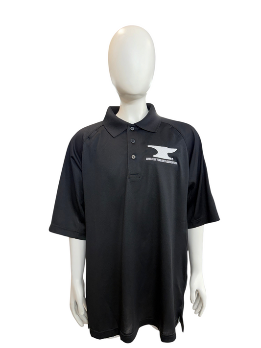 My Store black moisture-wicking polo shirt with white American Traders Association anvil logo embroidery on mannequin
