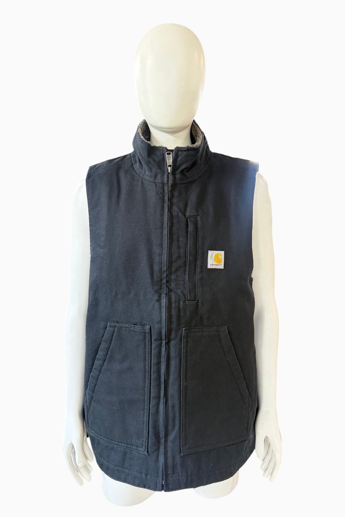 My Store Carhartt black washed duck sherpa-lined mock-neck vest on a mannequin